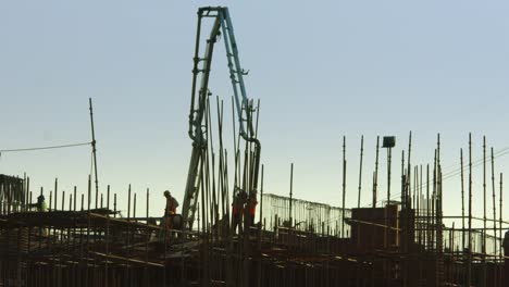 Time-Lapse-shot-of-manual-workers-working-at-a-construction-site
