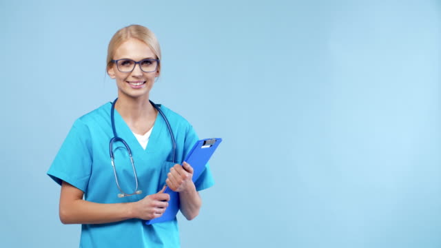 Portrait-of-cheerful-doctor-with-stethoscope-and-clipboard