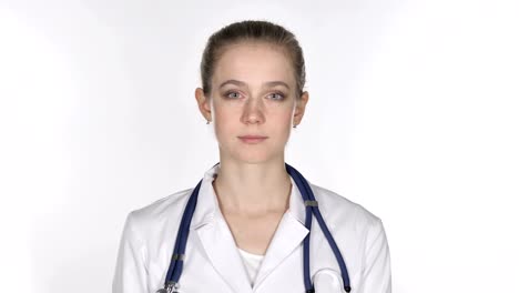 Young-Lady-Doctor-Looking-at-Camera,-White-Background