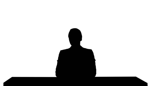 Silhouette-A-female-newsreader-presenting-the-news,-add-your-own-text-or-image-screen-behind-her