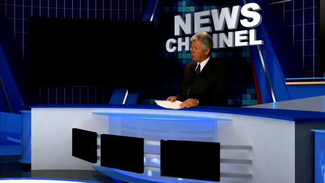 NEWS-REPORTER-AT-CONSOLE