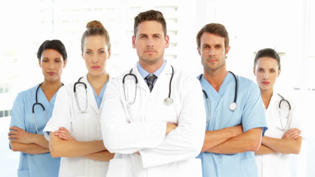 Serious-medical-team-with-arms-crossed