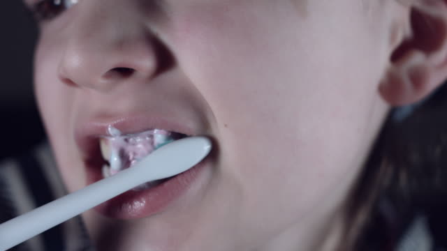 4k-Close-Up-Child-Mouth-Brushing-his-Teeth