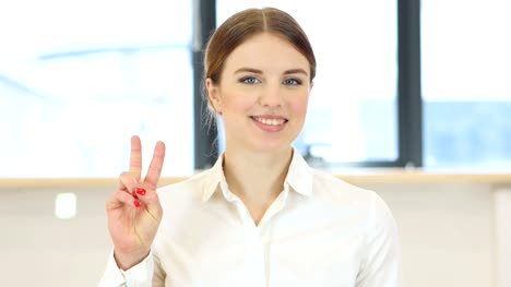 Victory-Gesture,--Woman-in-Office