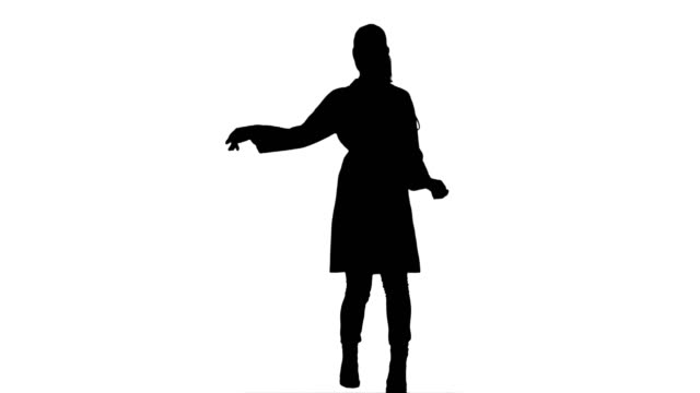 Silhouette-Smiling-young-woman-in-lab-coat-making-funny-dance