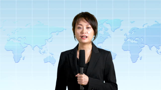 News-anchor-in-studio-with-map-display-in-background