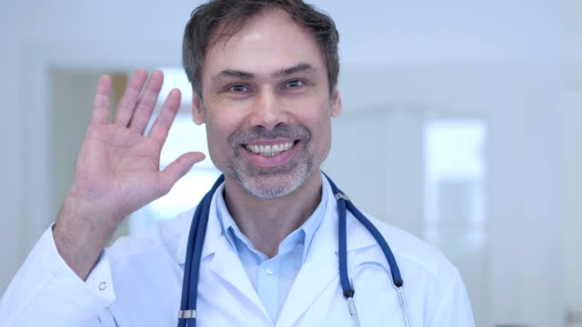 Hola,-saludando-mano-por-médico-en-el-Hospital