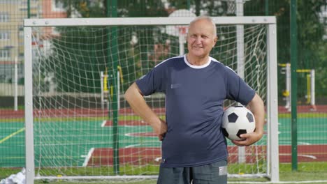 Portrait-of-Retired-Man-at-Goal-Net