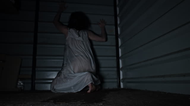 4k-Horror-Shot-of-a-Dirty-Zombie-Woman-Crawling-at-Camera