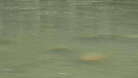 The-Ganges-River-flowing-quietly-at-Rishikesh,-India.-Vintage-filter,-close-up.