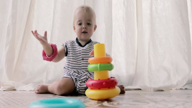 Adorable-baby-playing-with-toys