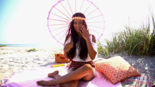 Portrait-of-Indian-American-girl-at-beach-picnic
