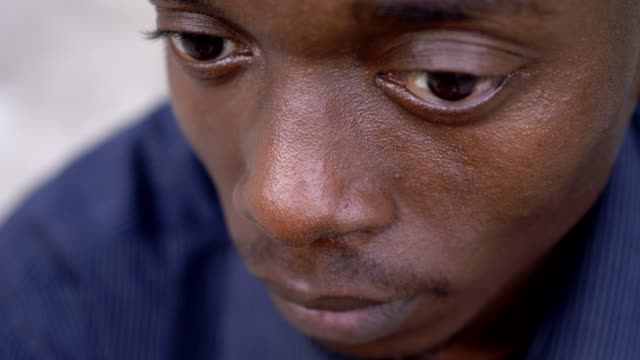 close-up-on-young-african-black-man-looking-around