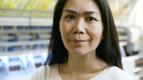 Middle-Aged-Asian-Woman-at-Textile-Factory