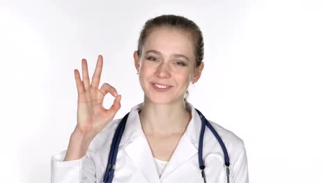 Portrait-of-Young-Lady-Doctor-Gesturing--Okay-Sign