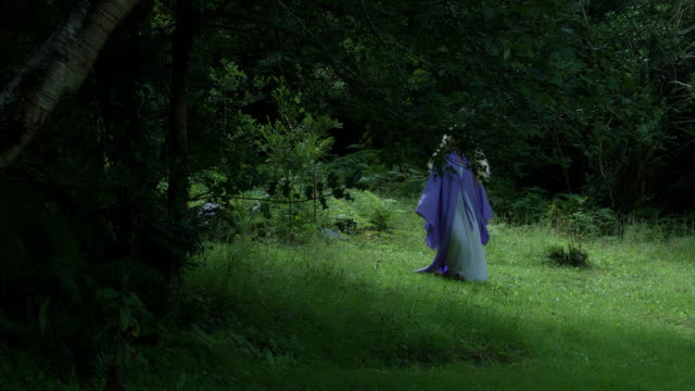 4k-Fantasy-Shot-of-a-Fairy-Walking-Barefoot-in-the-Forest