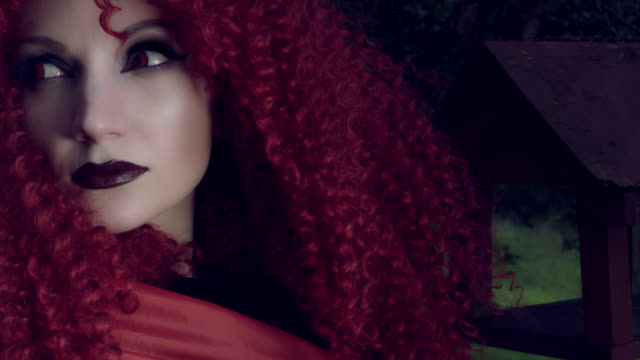 4k-Halloween-Shot-of-Red-Riding-Hood-posing,-face-close-up