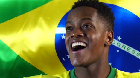 Brazilian-Young-Black-Man-Celebrating-with-Brazil-Flag