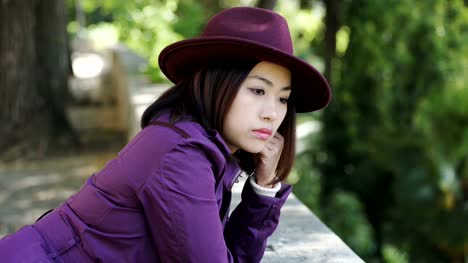 pensive,sad-young-asian-woman-portrait.-Thougtful-chinese-woman