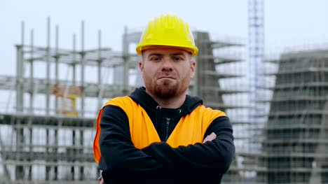 construction-worker-looks-at-the-camera-proud