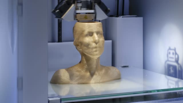 Arbeitenden-3D-Drucker-Drucken-einer-menschlichen-Büste---Symbol-für-künstliche-Intelligenz