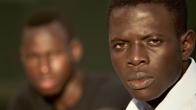 black-pride.-Two-serious-young-African-men-stare-at-the-camera---change-of-focus