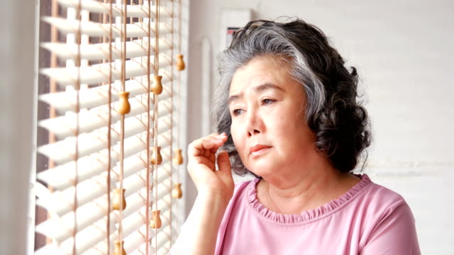 Asian-senior-woman-with-sad-emotion.