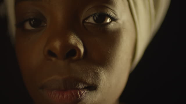 Close-up-of-Beautiful-Black-Woman-Looking-at-Camera
