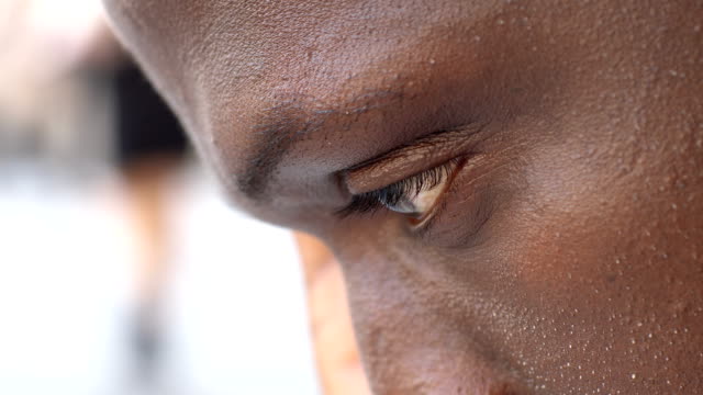sad-desperate-african-migrant-,-close-up
