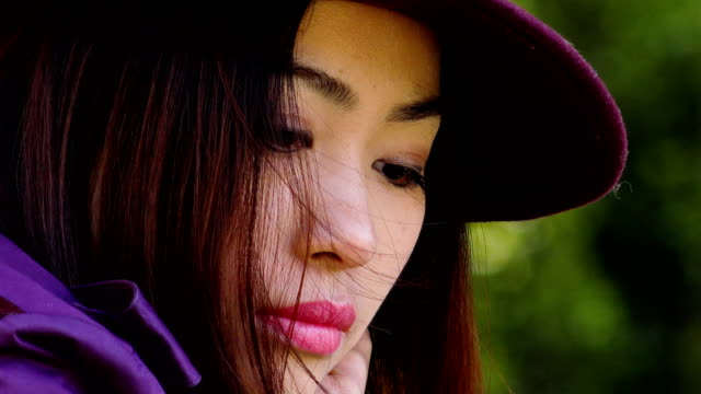 pensive-sophisticated-Asian-Woman-Portrait