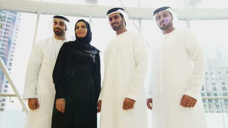 Portrait-male-female-Arabic-business-team-national-dress