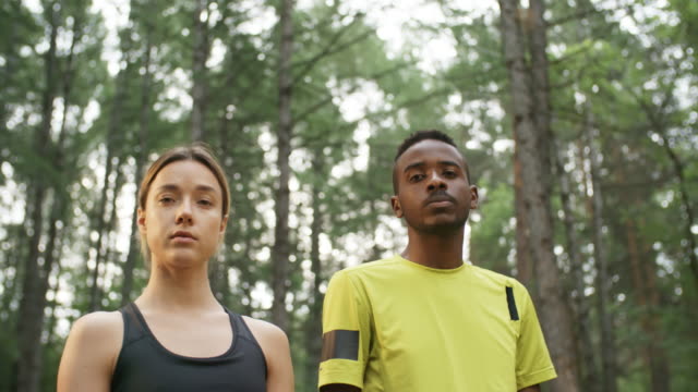 Confident-People-Posing-in-Forest