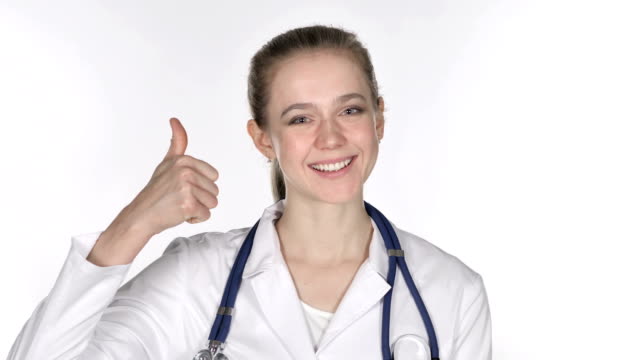 Portrait-of-Young-Lady-Doctor-Gesturing-Thumbs-Up