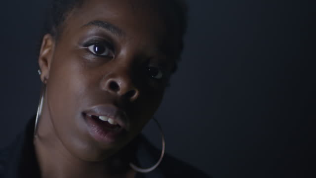 Portrait-of-Confident-Black-Woman-Moving-to-Rhythm