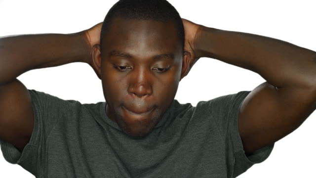 Stressed-young-man,-on-a-white-studio-background