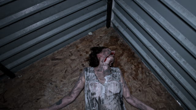 4k-Horror-Shot-of-a-Dirty-Zombie-Woman-Moving-Weird