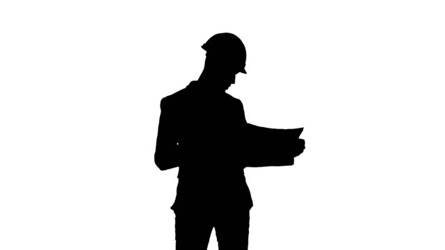 Silhouette-Architect-in-helmet-checking-construction-plan