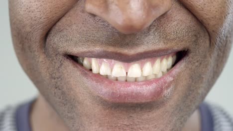 Extreme-Close-Up-of-a-Smile-of-an-Afro-American-Man