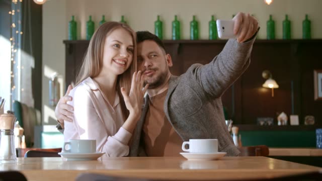 Engaged-Woman-Posing-for-Selfie-with-Boyfriend