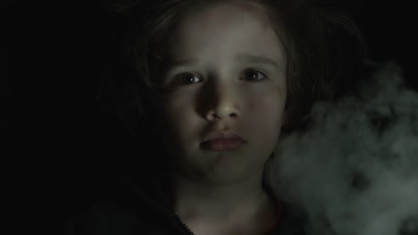 4k-shoot-of-a-child-being-exposed-to-smoke