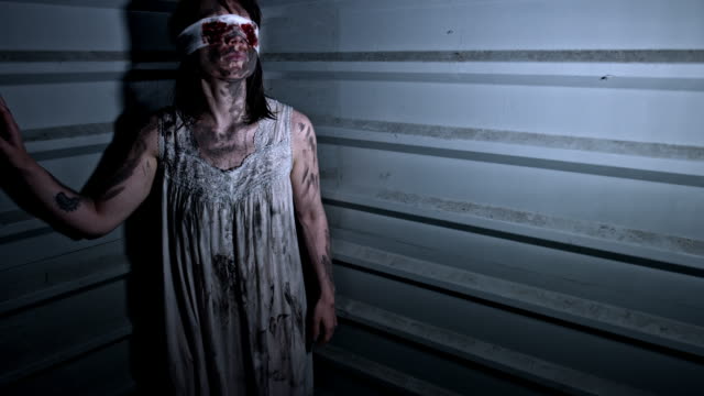 4k-Horror-Shot-of-a-Dirty-Zombie-Woman-Being-Abandoned
