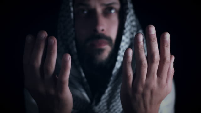 4k-Arabic-Man-Praying-with-Hands-Rised