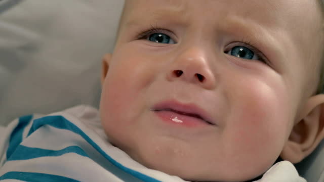 Little-baby-is-crying-and-mother-gives-him-a-dummy