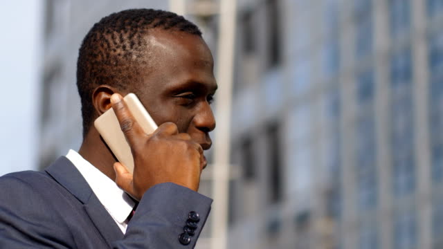 young-African-American-businessman-talking-on-the-phone
