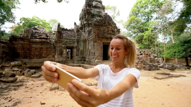 Girl-taking-selfie-portrait-at-ancient-temple