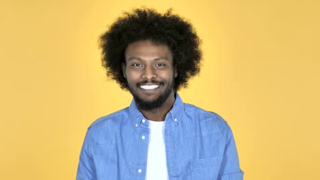Yes,-Afro-American-Man-Shaking-Head-to-Accept-on-Yellow-Background
