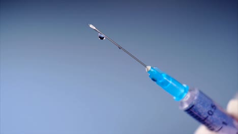 Drug-is-leaking-from-a-syringe.