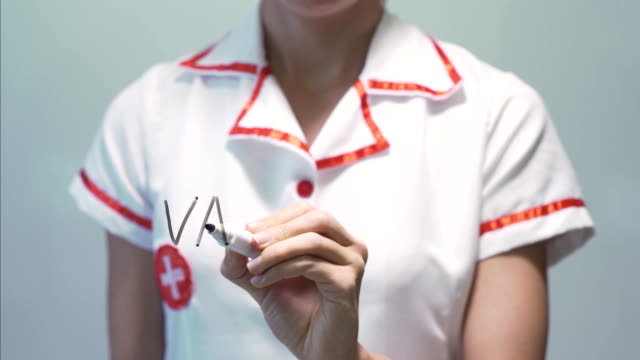 VACCINATION,-Female-doctor-writing-on-transparent-screen