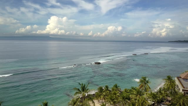 Panoramic-aerial-view-from-drone-on-sea,-seashore,-jungle-and-mountains,-Bali,-Indonesia