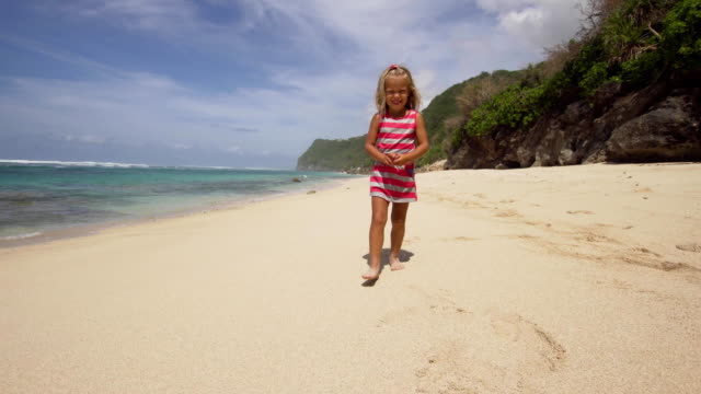 Child-runs-along-the-beach